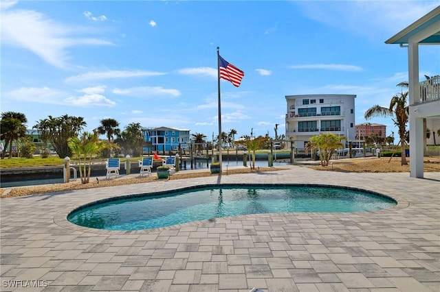 pool featuring a patio area