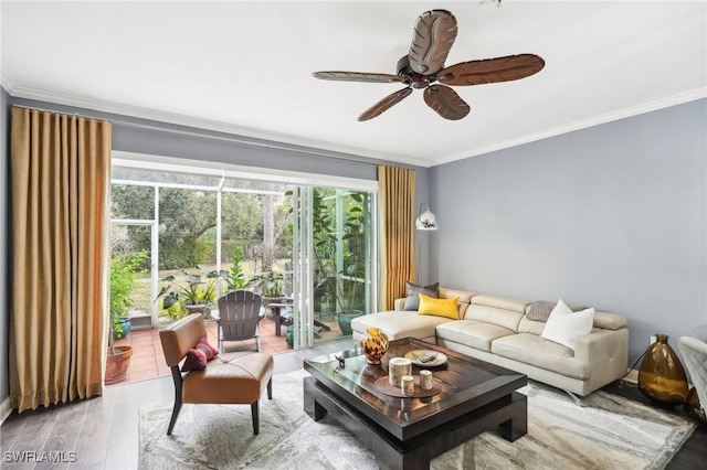 living room featuring ceiling fan, hardwood / wood-style floors, and crown molding