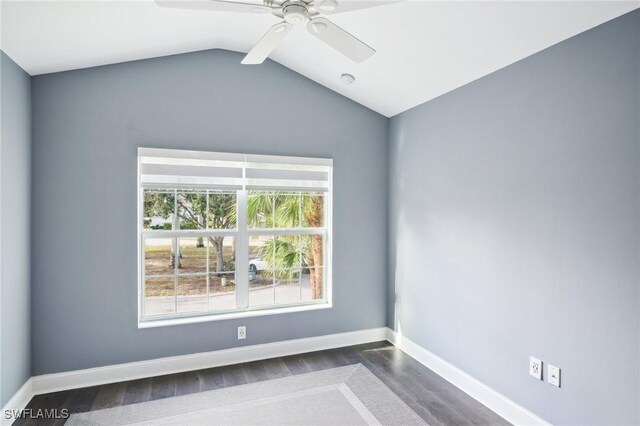 empty room featuring ceiling fan and vaulted ceiling