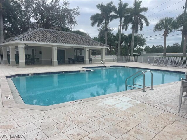 view of swimming pool featuring a gazebo and a patio