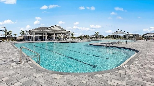 view of pool featuring a patio area