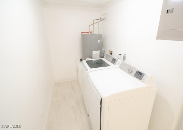 laundry room with washer and dryer, electric panel, and water heater