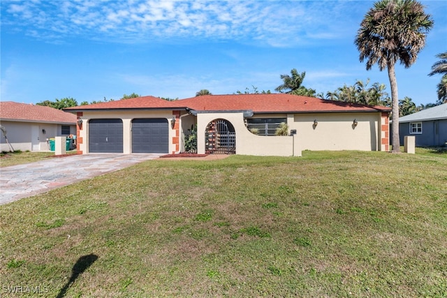 view of front facade featuring a garage and a front lawn