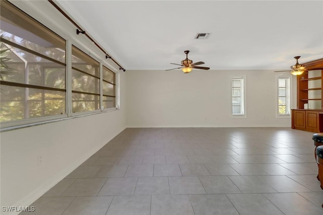 spare room featuring ceiling fan