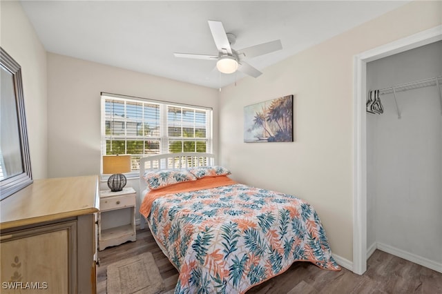 bedroom featuring ceiling fan, a closet, and light wood-type flooring