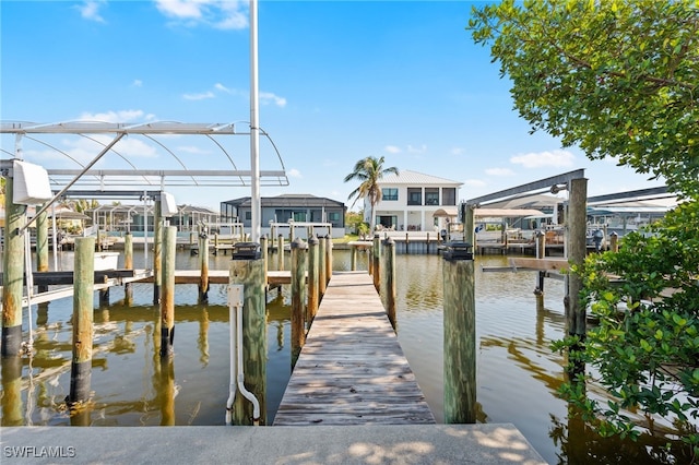 dock area with a water view