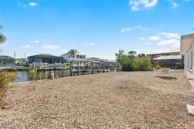 dock area with a water view