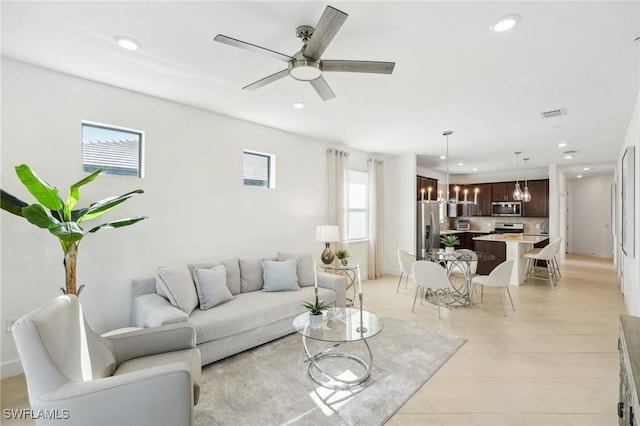 living room featuring ceiling fan