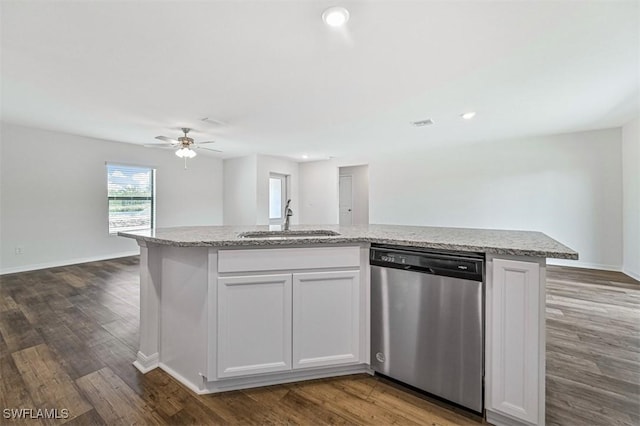 kitchen with sink, stainless steel dishwasher, ceiling fan, an island with sink, and white cabinetry