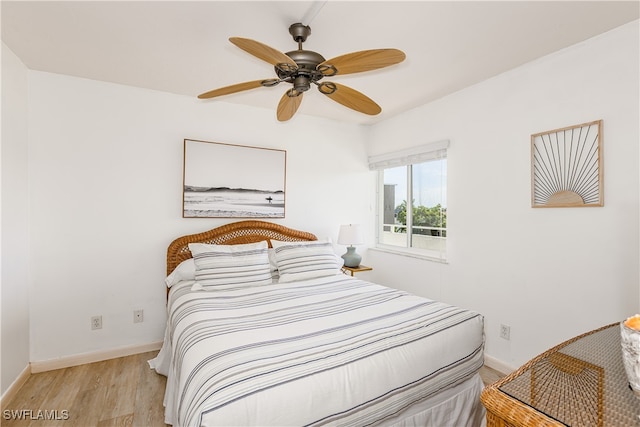 bedroom featuring ceiling fan and light hardwood / wood-style floors