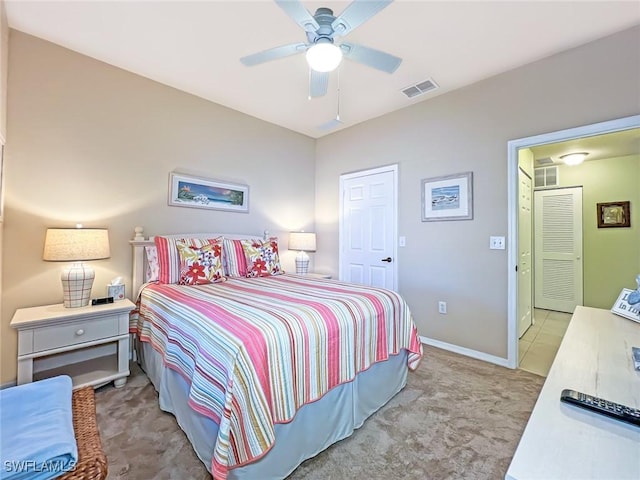 carpeted bedroom with ceiling fan