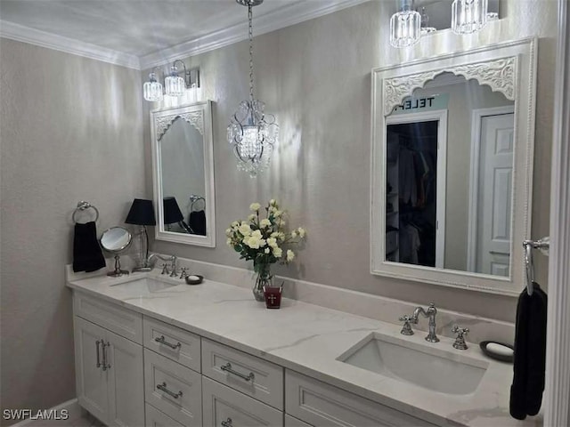 bathroom featuring ornamental molding and vanity