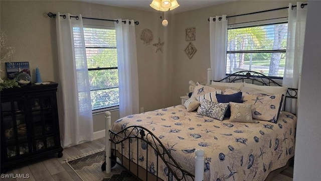 bedroom featuring hardwood / wood-style flooring