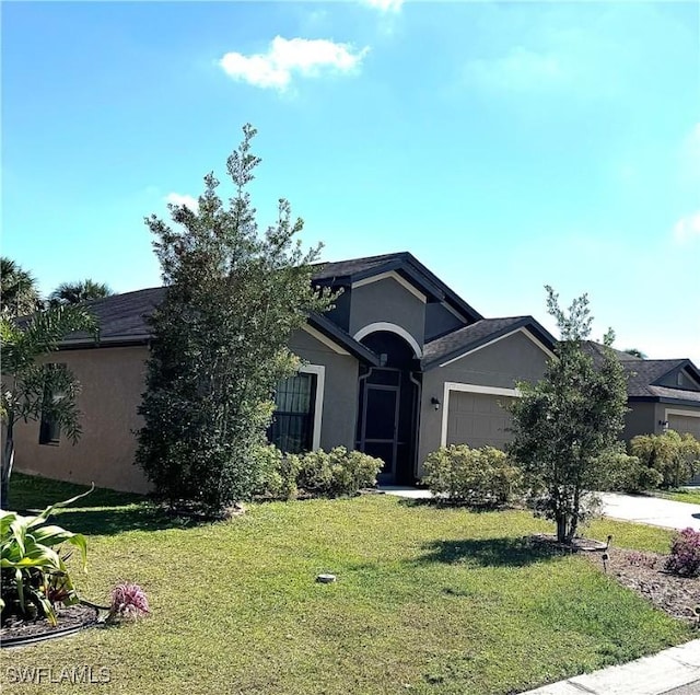 ranch-style house featuring stucco siding, driveway, a front lawn, and an attached garage