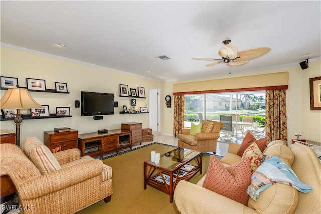 living room featuring crown molding and ceiling fan