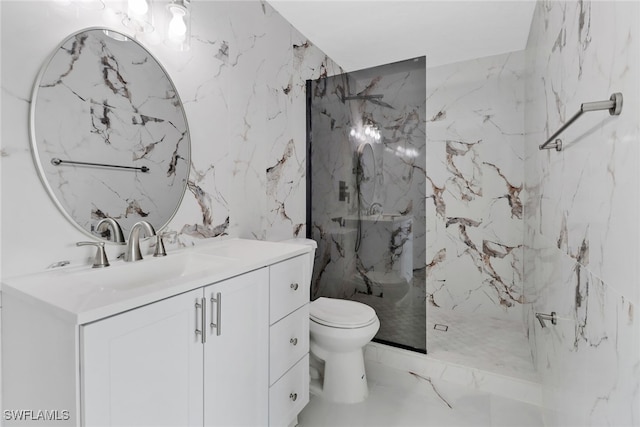 bathroom featuring toilet, vanity, and a tile shower