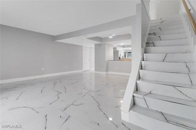 interior space with stainless steel fridge with ice dispenser