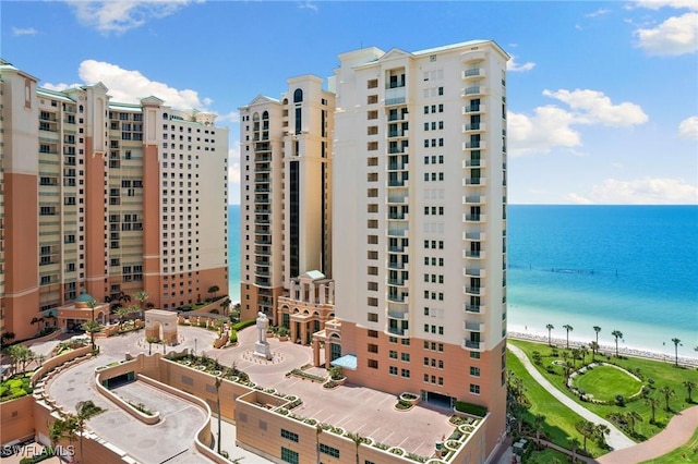 view of building exterior with a water view