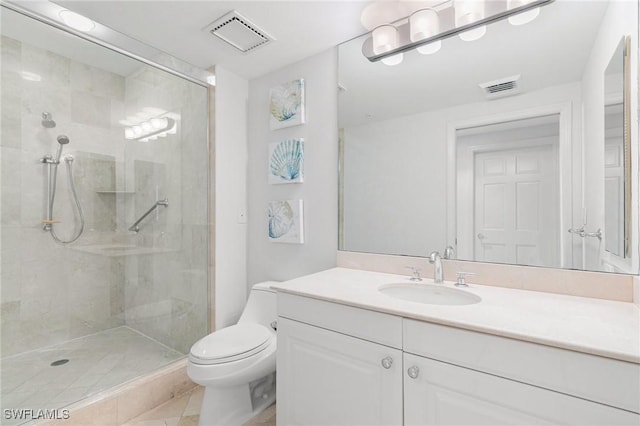 full bathroom with vanity, toilet, visible vents, and a stall shower