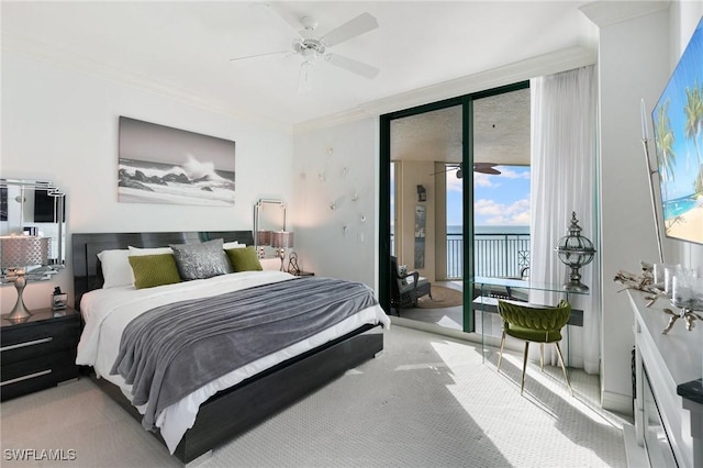 bedroom with ceiling fan, access to outside, carpet, and ornamental molding