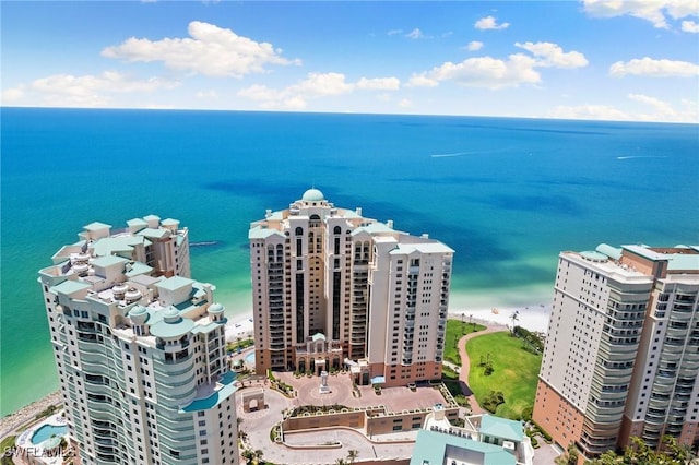 bird's eye view featuring a view of city and a water view