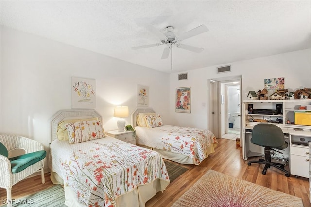 bedroom featuring ceiling fan and light wood-type flooring