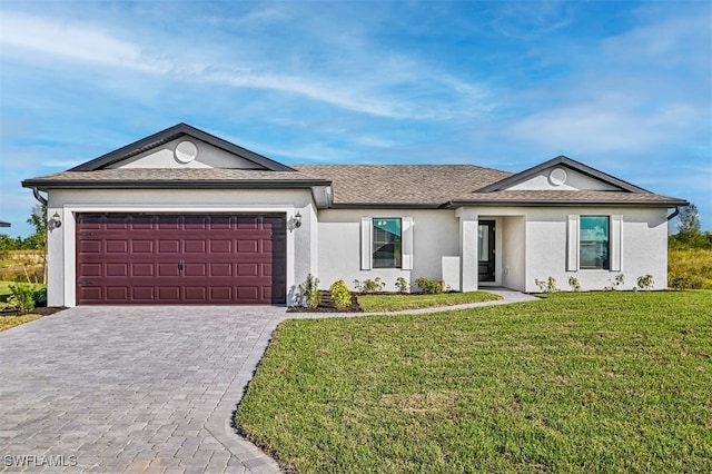 ranch-style house with a garage and a front yard