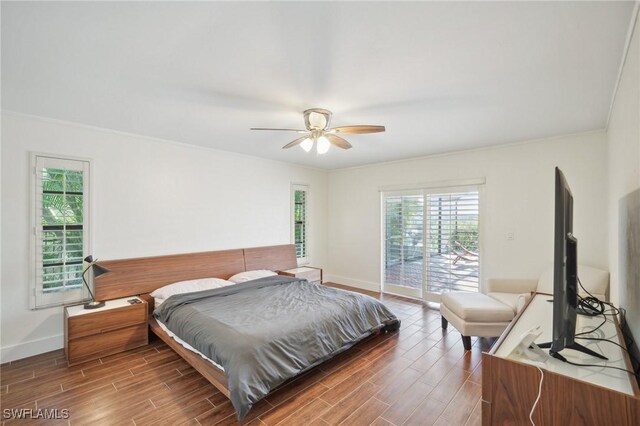 bedroom with ceiling fan, access to outside, and ornamental molding