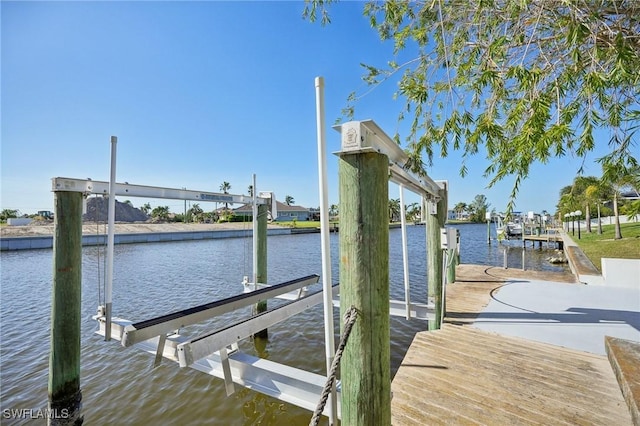 dock area featuring a water view