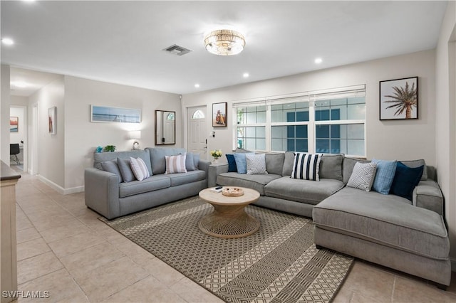 living room with light tile patterned floors