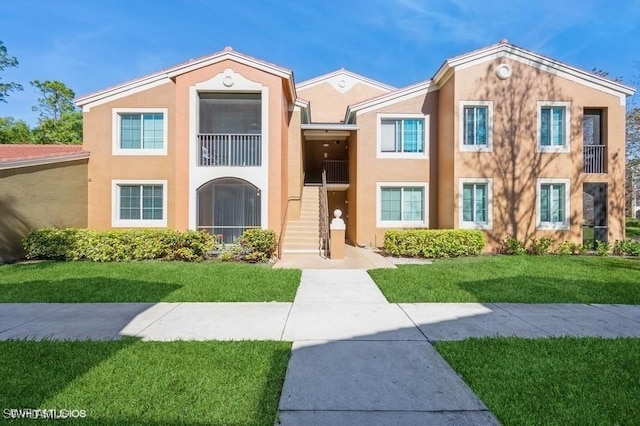 view of front of home with a front yard