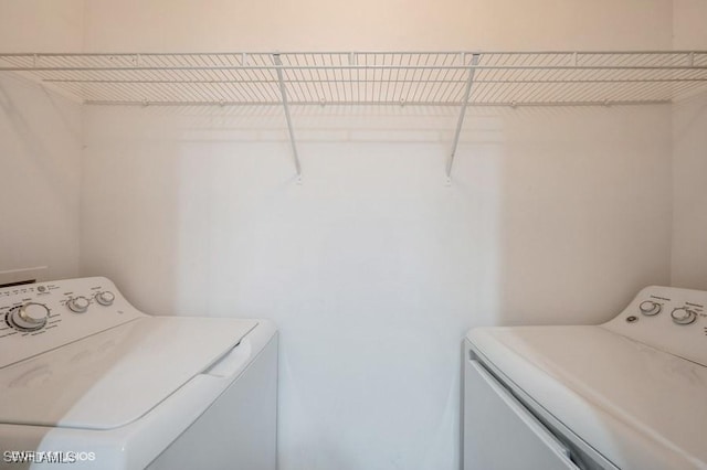 laundry room with washer and dryer