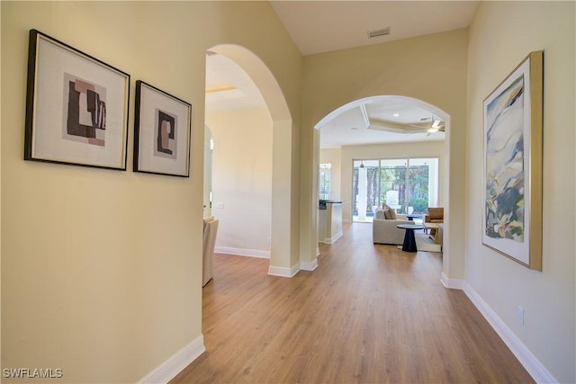 hallway featuring light hardwood / wood-style flooring