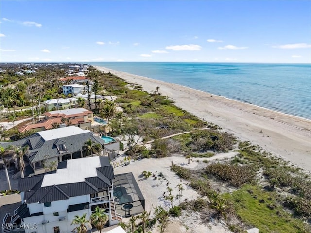 aerial view with a view of the beach and a water view