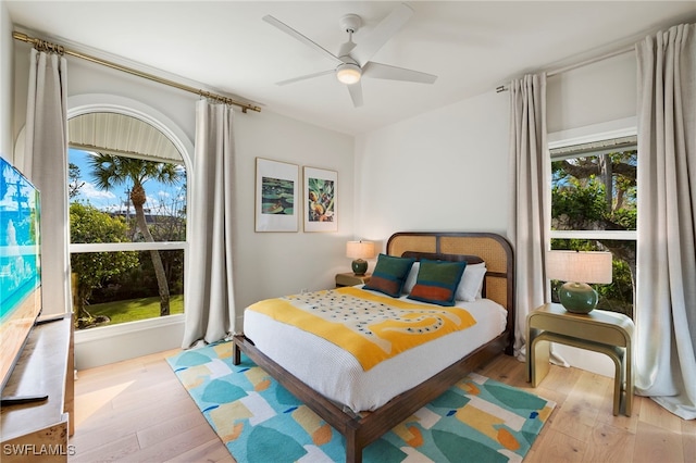 bedroom featuring ceiling fan and hardwood / wood-style floors