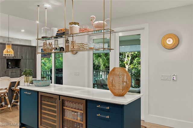 bar featuring a wealth of natural light, a bar, wine cooler, and light wood-style flooring