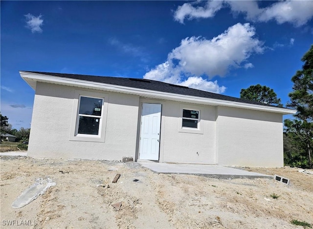 rear view of property with a patio