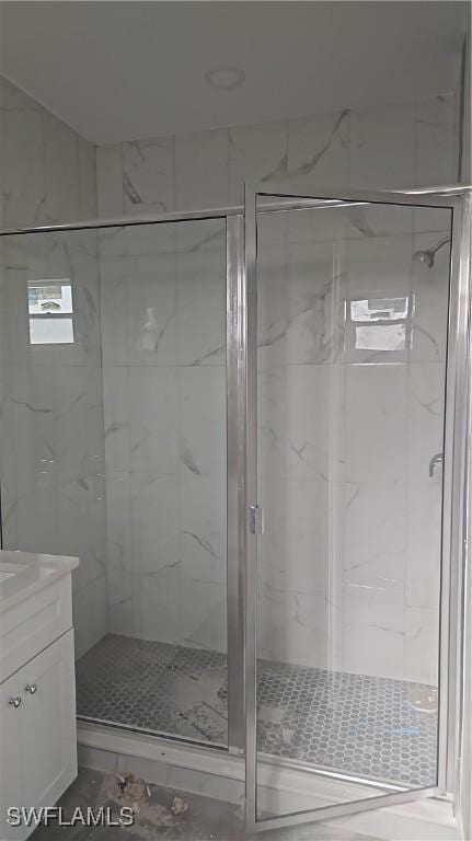 3019 32nd St W, Lehigh Acres, FL 33971 - full bath with vanity and a shower stall