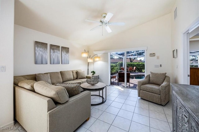 tiled living room featuring vaulted ceiling and ceiling fan