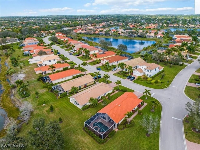 drone / aerial view with a water view