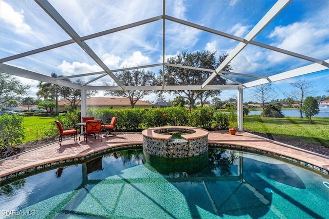 view of pool featuring a lanai, a patio area, an in ground hot tub, and a water view