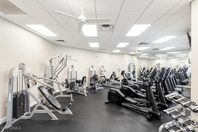 workout area featuring a paneled ceiling