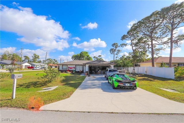 single story home with a garage and a front lawn