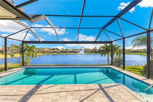 view of pool featuring a water view, a patio area, and a lanai