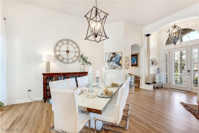 dining space featuring light wood-type flooring