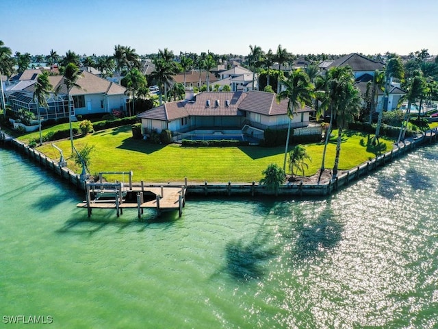 bird's eye view with a water view