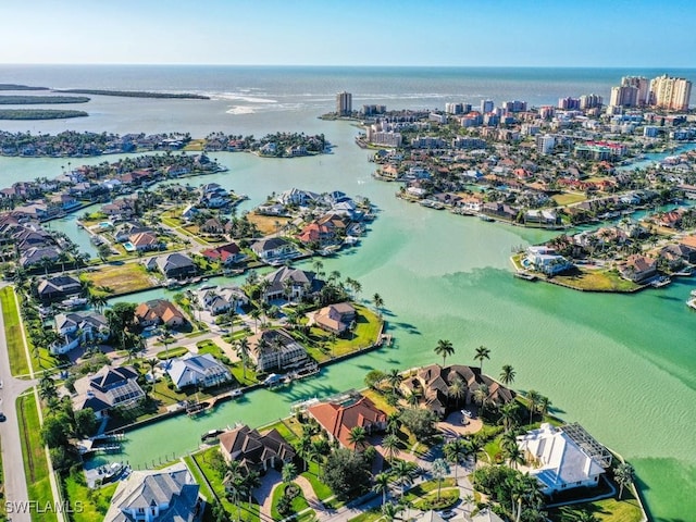 bird's eye view with a water view