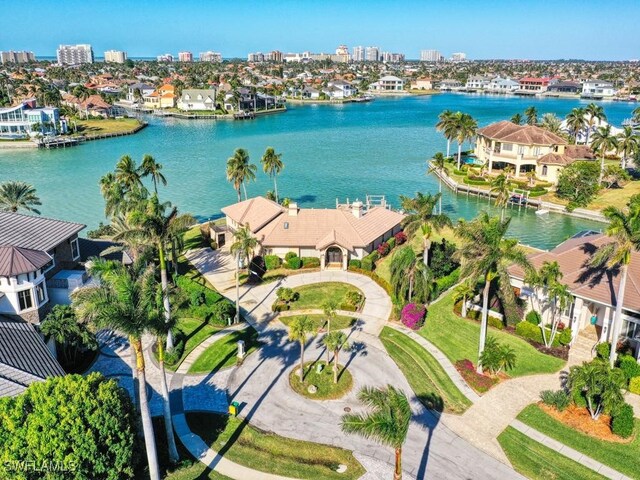 birds eye view of property featuring a water view