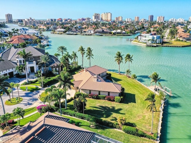 bird's eye view with a water view