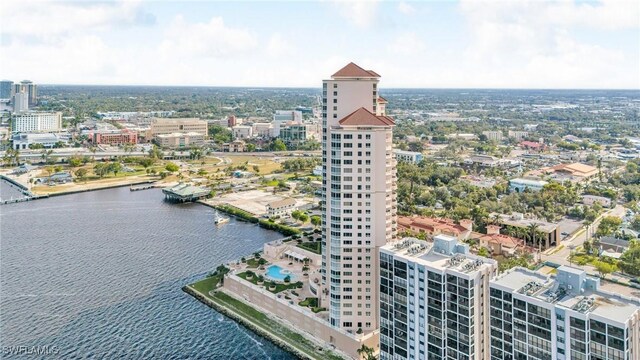 birds eye view of property featuring a water view